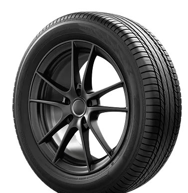 Black car tyre with a dark alloy wheel and clearly visible tread pattern on a transparent background.